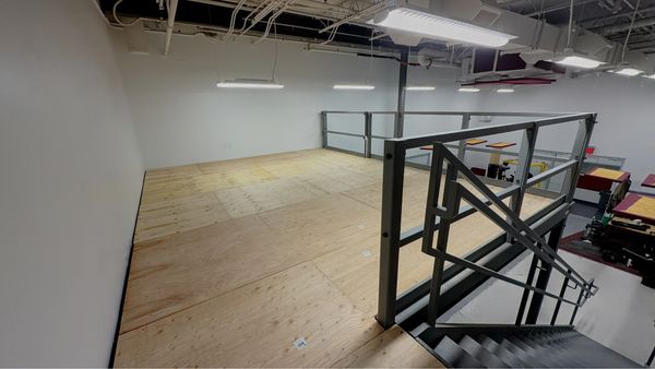 A new mezzanine completed with railings around by SoFlo modular office installations nationwide