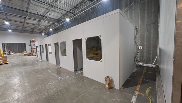 new modular installations & designs building for offices inside a warehouse in Golsboro NC by SoFlo 