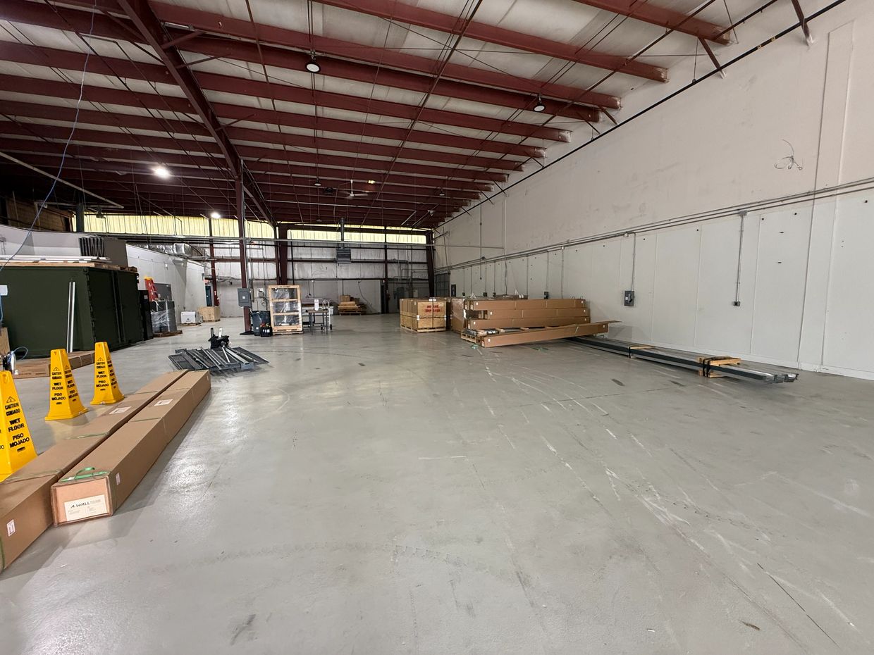 An empty warehouse storage to get starter on a new modular installations of a tall-wall building 