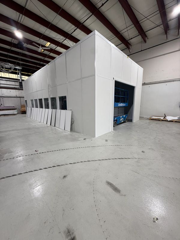 In-Plant modular buildings installations Of a tall-wall building inside a warehouse setting by SoFlo