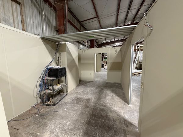 A new prefab modular rooms installations inside an industrial warehouse in Galva Illinois by SoFlo 