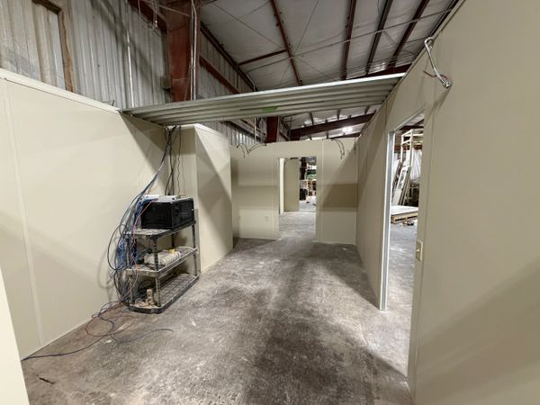 A new prefab modular rooms installations inside an industrial warehouse in Galva Illinois by SoFlo 