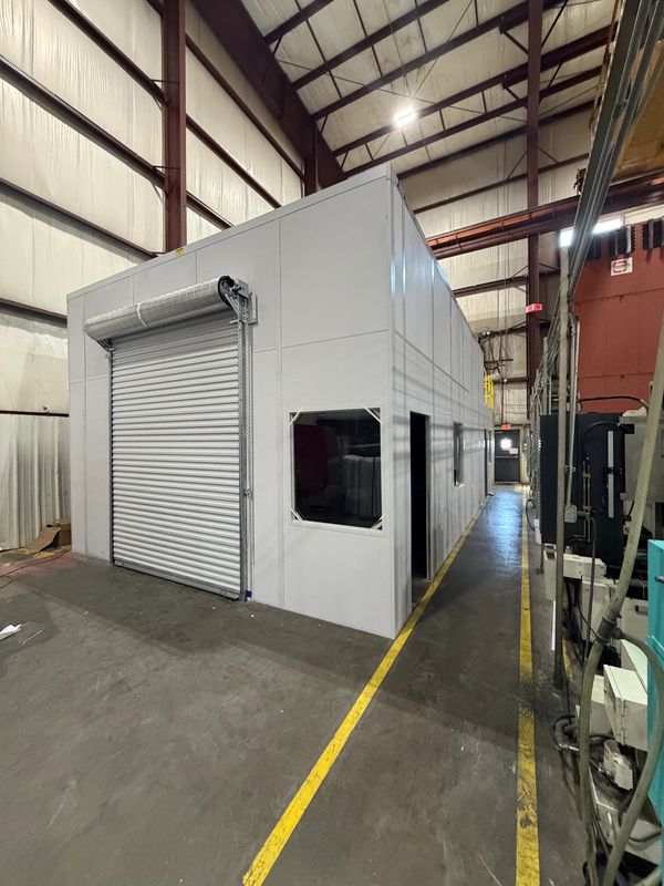 A new modular office installation with tall-wall, rolling garage door in Inka, Mississippi  by SoFlo