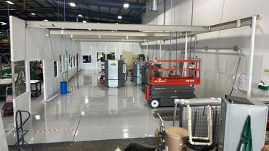 A newly modular tall wall building machinery enclosure inside a an industrial setting by SoFlo Insta