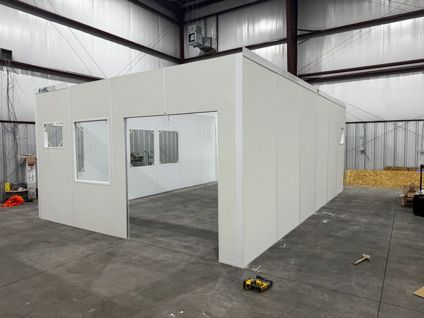 A new modular office solutions installations by SoFlo inside a warehouse setting