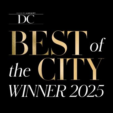 Elegant 'Best of the City Winner 2025' announcement in gold and white on black.