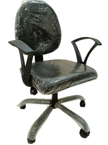 Black office chair wrapped in protective plastic.