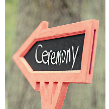 Arrow sign pointing left with 'Ceremony' written.