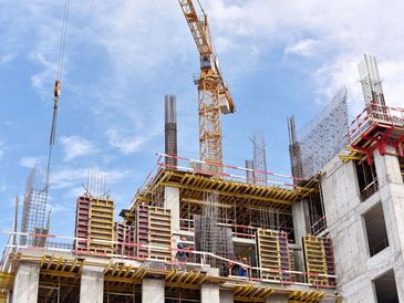 A new building is being constructed with use of tower crane