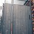 custom made black metal gate system in alleyway 