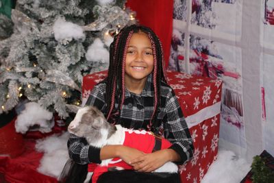 Christmas picture with baby goat