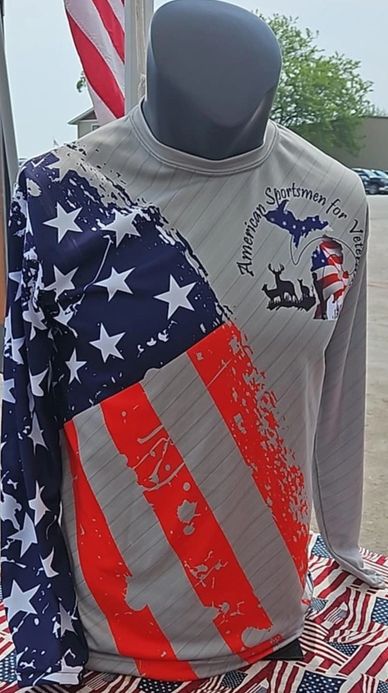 Patriotic shirt with American flag and wildlife design for veterans.