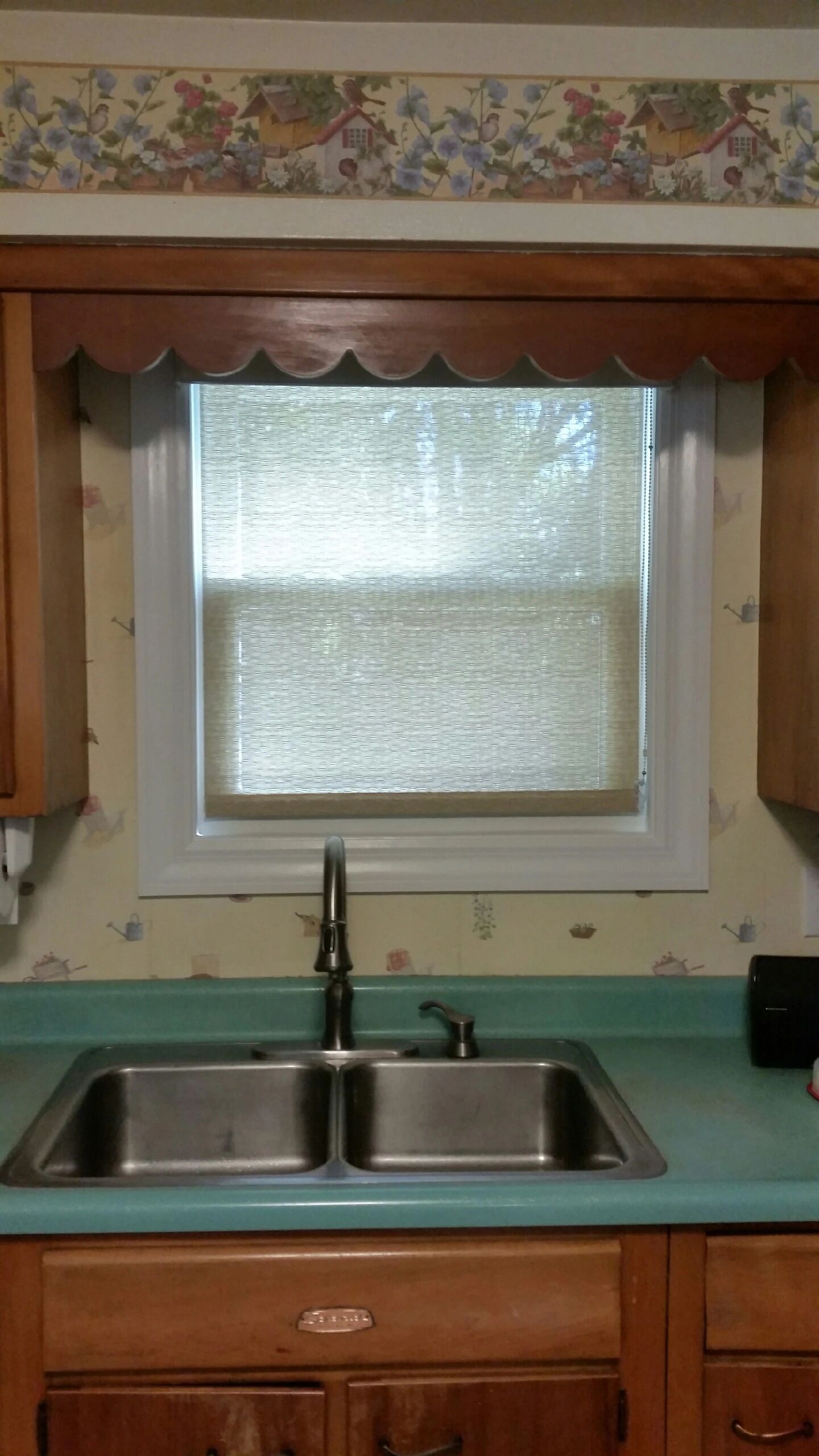 Roller shade over a kitchen sink