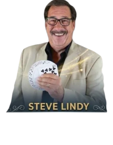 Steve Lindy smiling, holding playing cards.