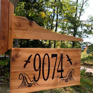 Engraved House signs with hand cut corbel.