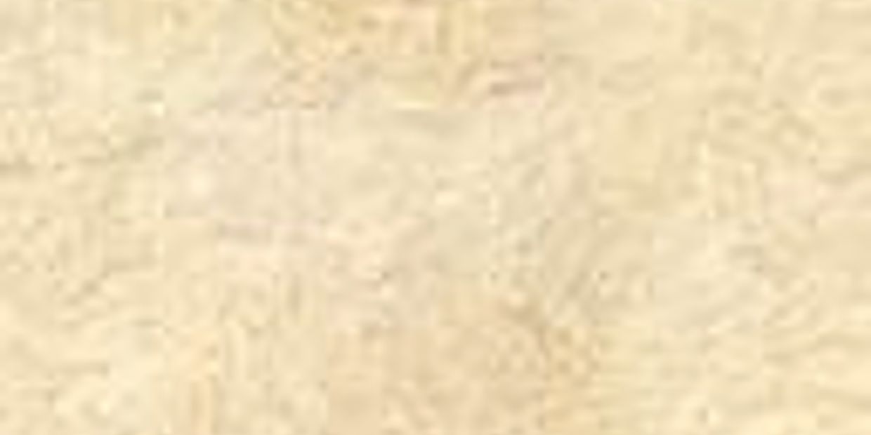 Close-up of beige textured surface with subtle patterns.