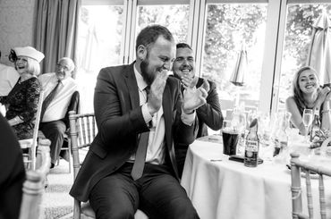 Laughing during speeches photograph.  Coed Y Mwstwr Hotel 