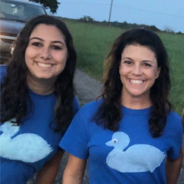 Two women who are members of the Just Ducky Hot Air Balloon crew