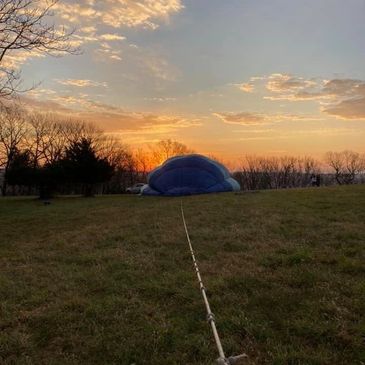 Inflating hot air balloon for a sunrise hot air balloon ride 