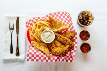 A picture of the snacks and sauce served on the table 