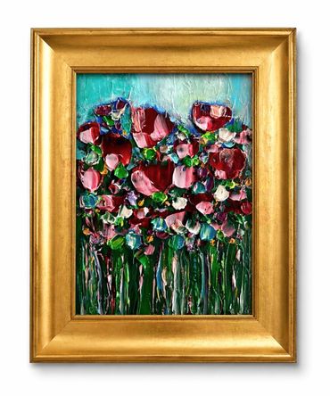 Textured painting of vibrant flowers in a gold frame.