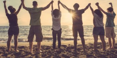 A happy group by the beach