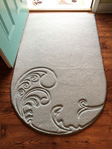 Premium light blue carpet, bespoke scroll pattern, unique shaped entrance rug
