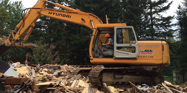 Carl Emond excavation déneigement démolition à Saint-Donat location de conteneur tamisage mobile