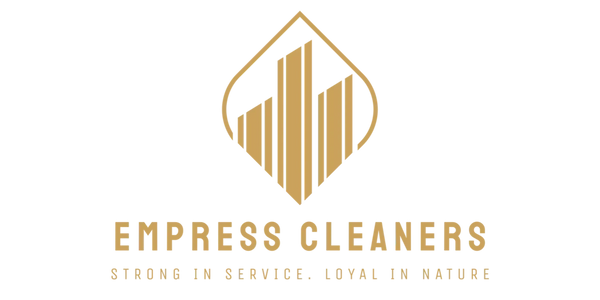 Gold and black logo for Empress Cleaners with a building and droplet design.