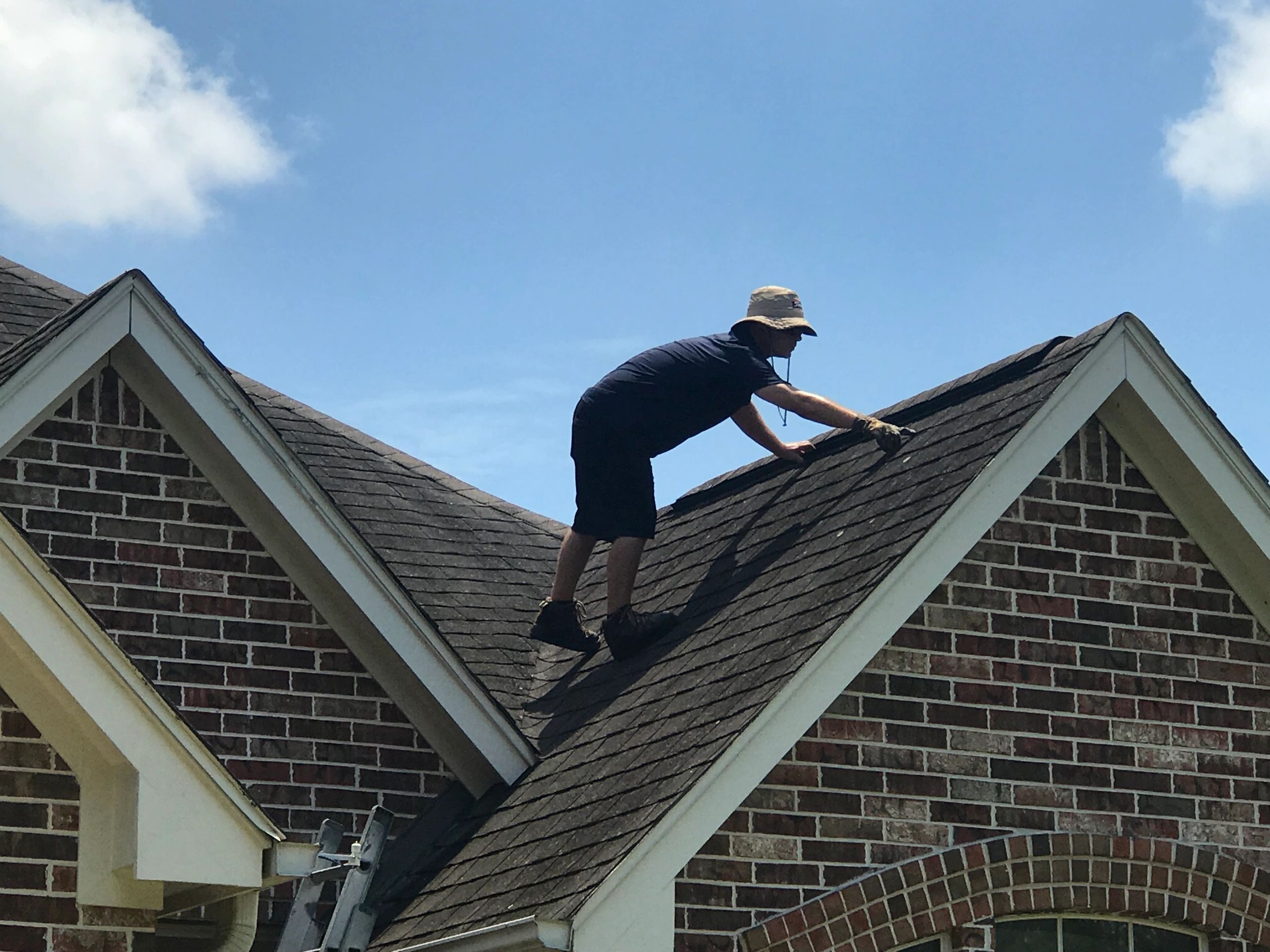 Keystone Contracting Group inspecting roof for hail damage