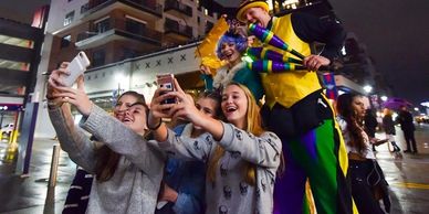 The Amazing Ziggy Walks on Stilts and Juggles while strolling around offering Selfies & High Fives!