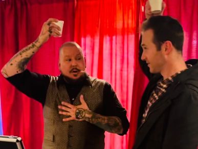 Close up Magic in a Parlor Style setting for a stage show with up-close magic in a group setting.