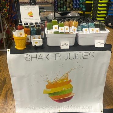 Pop up events, table with fresh cold press juices on display 