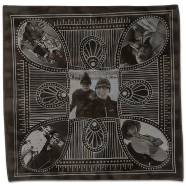 Black and white printed fabric with portraits.