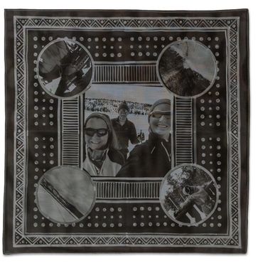 Black and white patterned scarf with photo collage design.