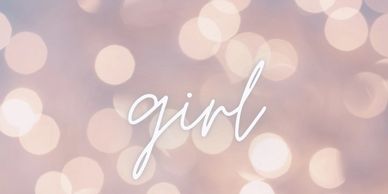 Word 'girl' over blurred pink and white lights.