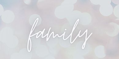 The word 'family' in white script on a soft pastel background.