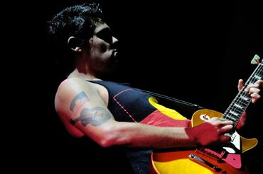photograph of aboriginal guitar player dan sultan by indigenous photographer wayne quilliam