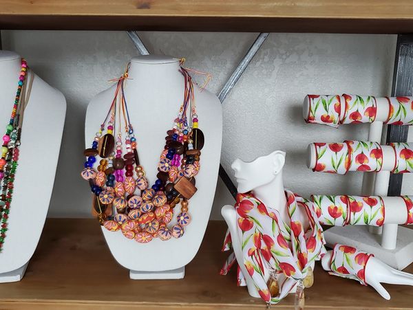 Handmade floral tulip jewelry for women including necklaces and bracelets.