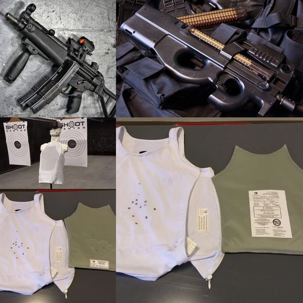 Two firearms and bulletproof vests with bullet marks displayed in a shooting range setting.