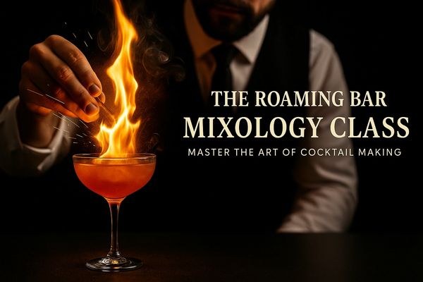 Bartender shaking a cocktail — TheRoamingBar’s mixology classes blend learning, flavor, and fun.