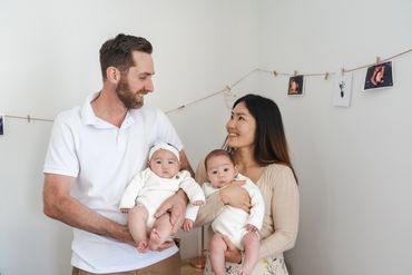 couple showing a new born baby
