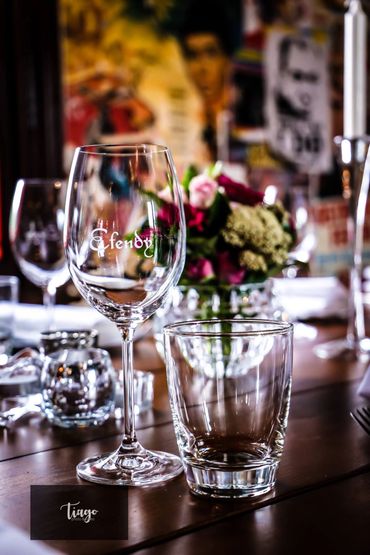 decoration with glass and flowers on the table