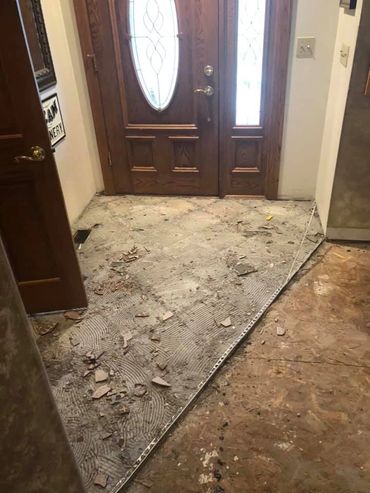 Removing tile from a front entry way