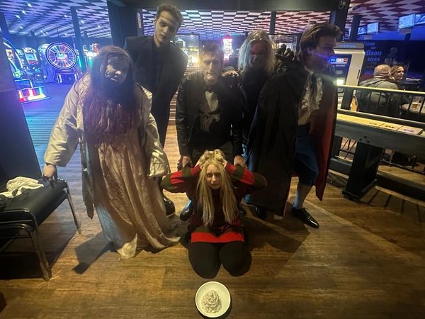 The Cast recreate the poster