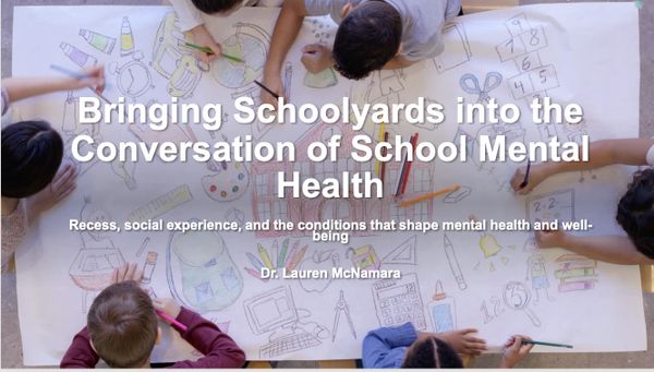 Children drawing together with a message on school mental health.