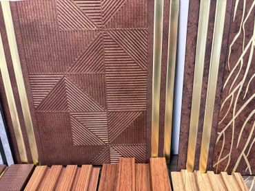Wooden panels with geometric and striped patterns.