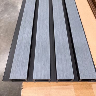 Four metallic rectangular bars with a brushed finish arranged vertically.
