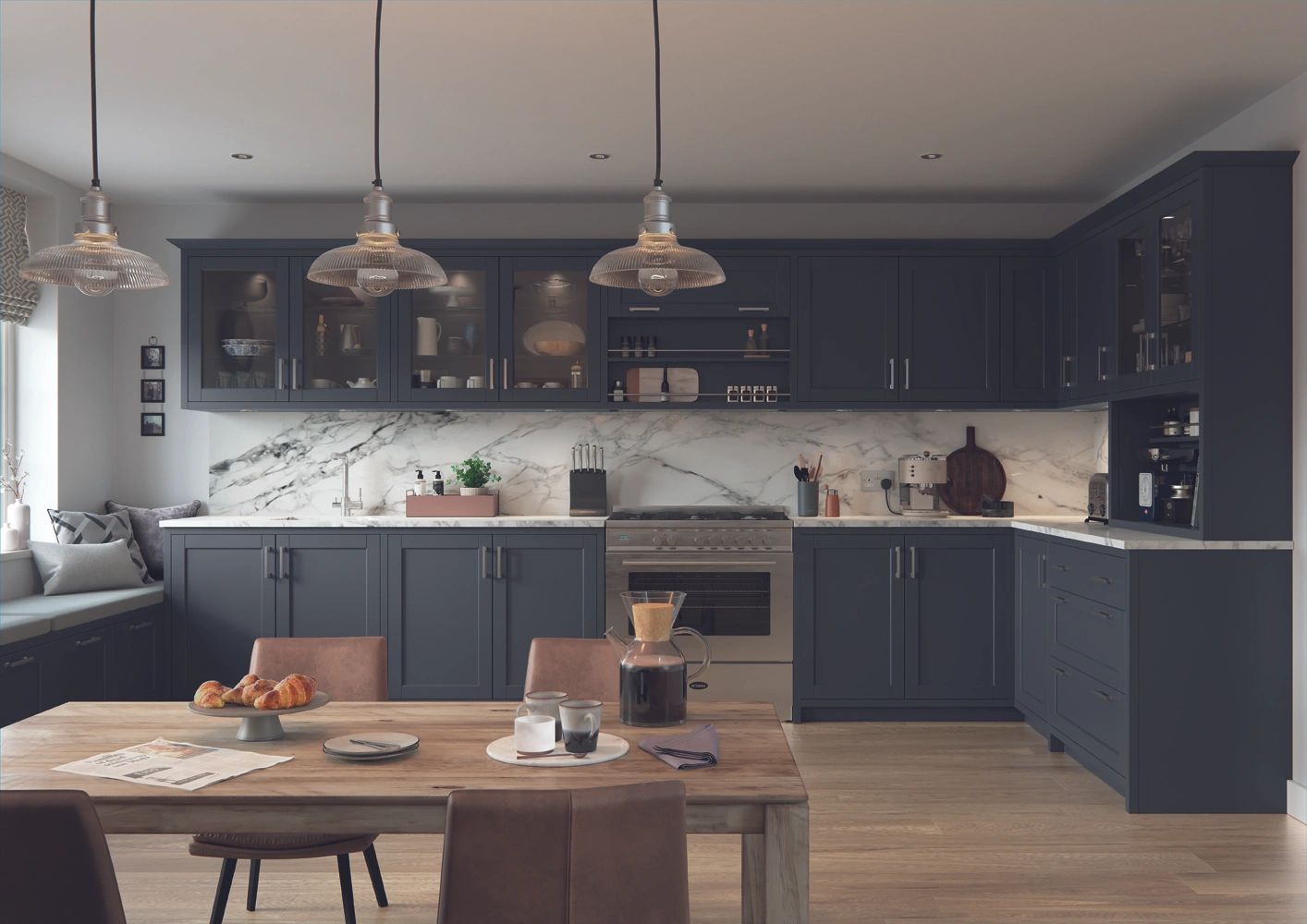 Blue traditional Shaker kitchen with marble worktops and upstands