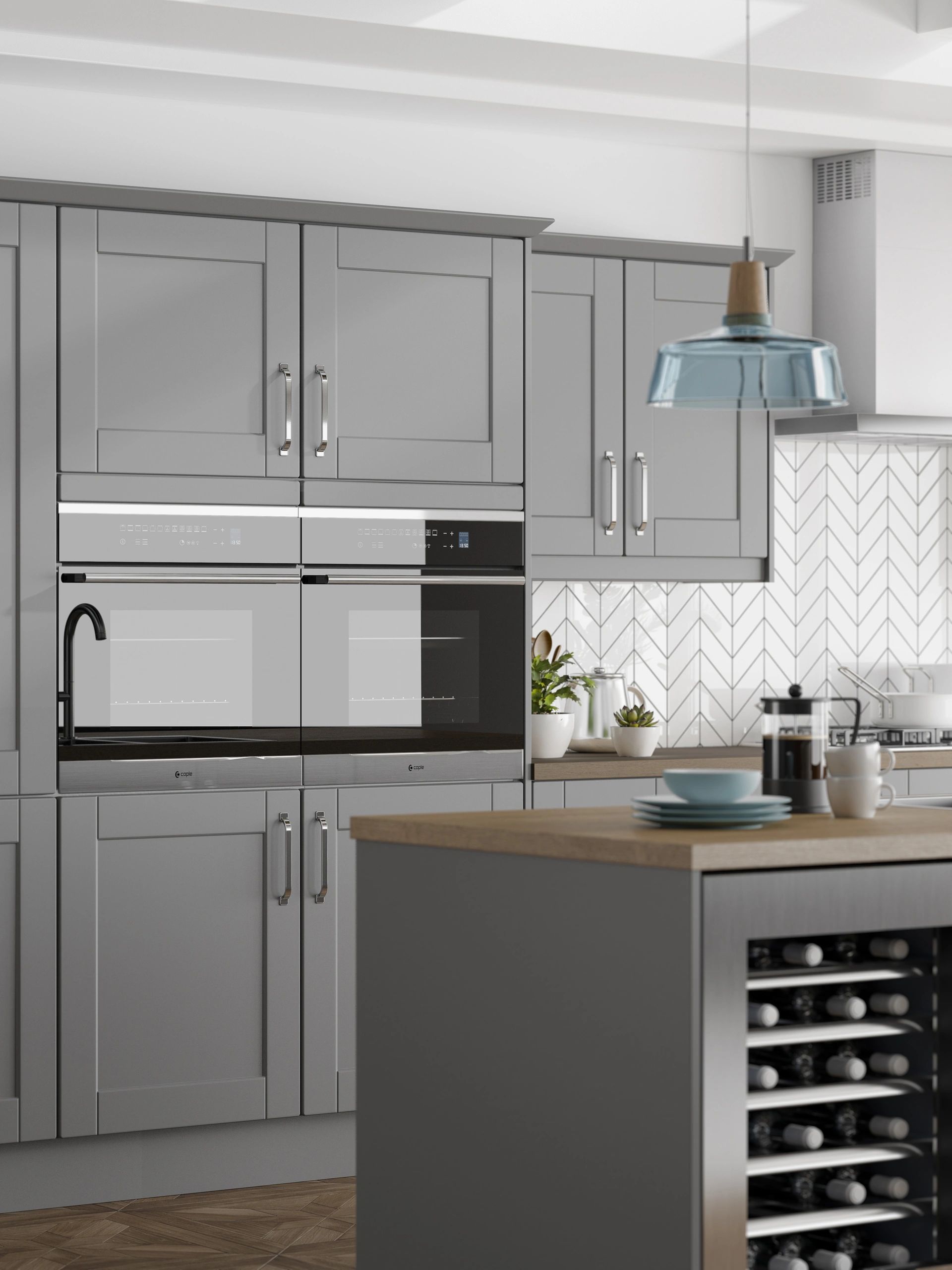Grey 1 piece traditional Shaker kitchen with oak worktops, double oven and wine fridge